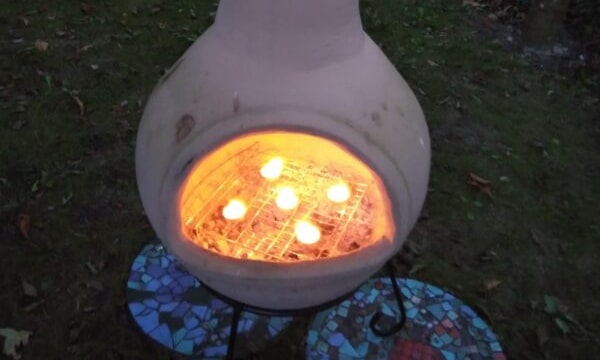 chiminea with candles